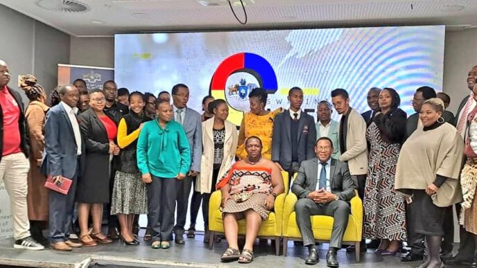 Ministers Phila Buthelezi and Harries Bulunga pose with stakeholders during the official opening of the 2023 Eswatini Career Expo.
