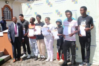 Deputy Prime Minister Thulisile Dladla and BSA Training Centre representatives present scholarship awards to beneficiaries, marking a milestone in supporting vulnerable youth in Eswatini.