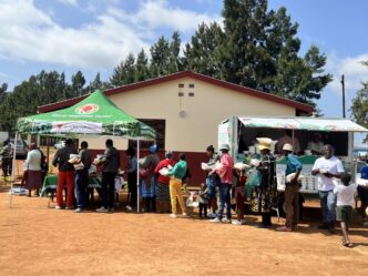 Residents of Nkhaba Inkhundla receive vegetable seeds and nutrition education during a community health outreach.