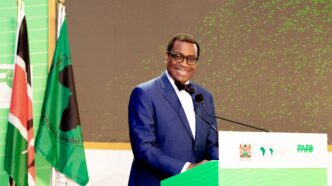 Dr. Akinwumi A. Adesina, President and Chairman of the Board of Directors, African Development Bank Group, stands at the lectern during Scaling SHF Finance Conference: Day 2 Opening Session.