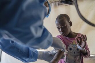 A Mpox patient receiving treatment in the DRC.