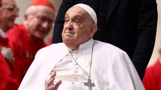 Pope Francis greets cardinals as he unexpectedly appears during the Palm Sunday Mass in Saint Peter's Square at the Vatican, April 13, 2025. Yara Nardi/Reuters