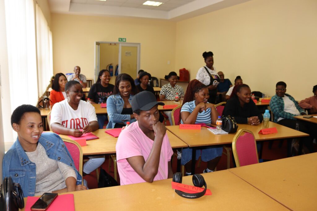 Participants of the ESGM entrepreneurship workshop celebrate the completion of their five-day training at SEDCO Manzini Estate.