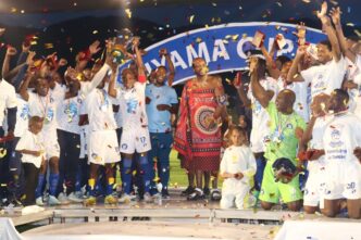 His Majesty King Mswati III presents trophies to the 2025 Ingwenyama Cup champions during a vibrant ceremony at Somhlolo National Stadium.