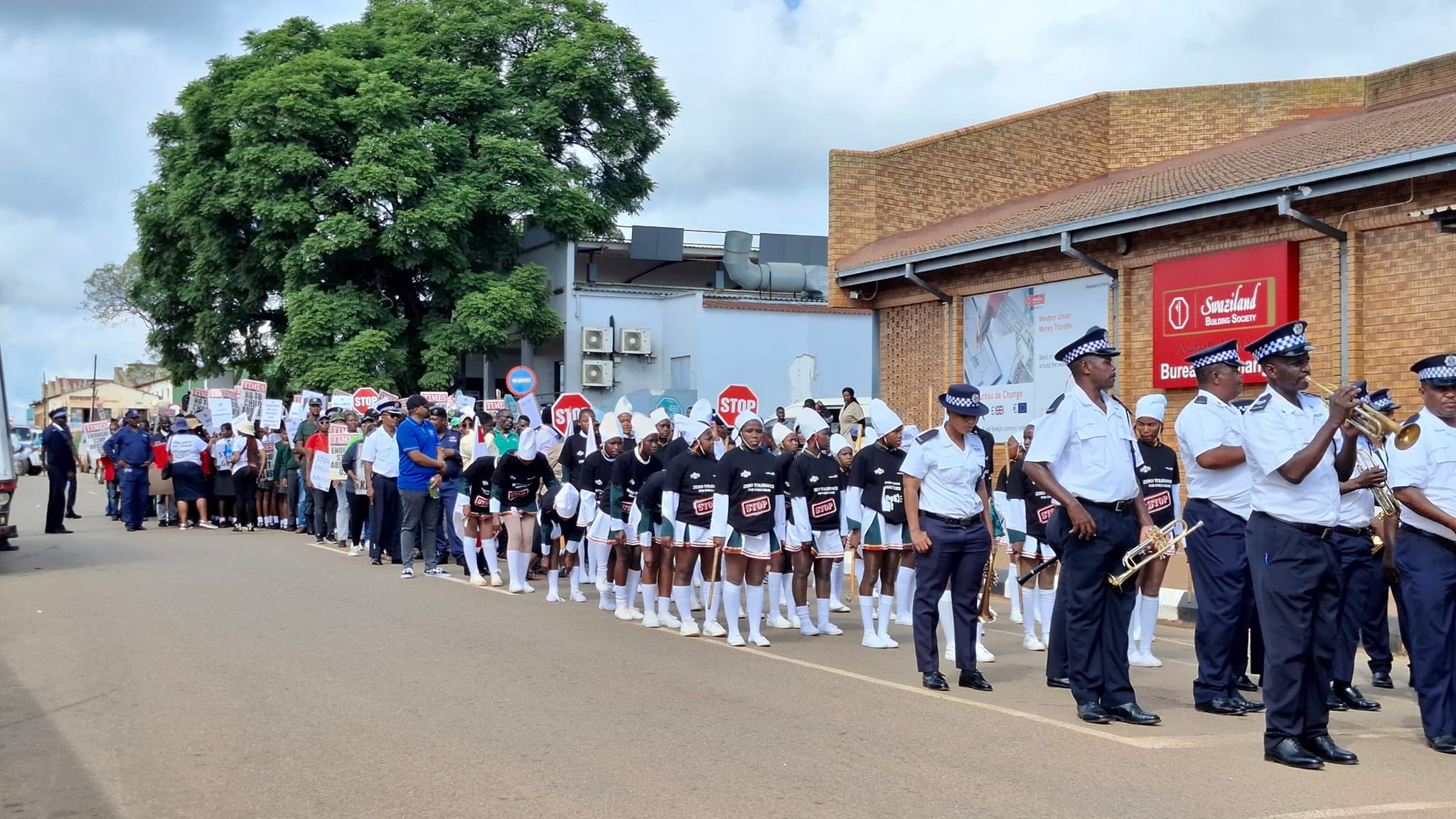 Community members and partners march through Nhlangano to demand justice and protection for children and vulnerable groups.
