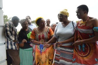 Nomphumelelo Sithole with Deputy Prime Minister Thulisile Dladla during the handover of her new home in Ndzangu.