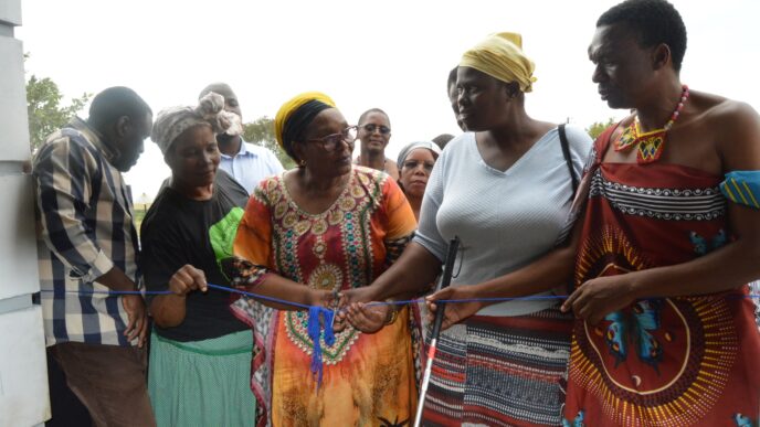 Nomphumelelo Sithole with Deputy Prime Minister Thulisile Dladla during the handover of her new home in Ndzangu.