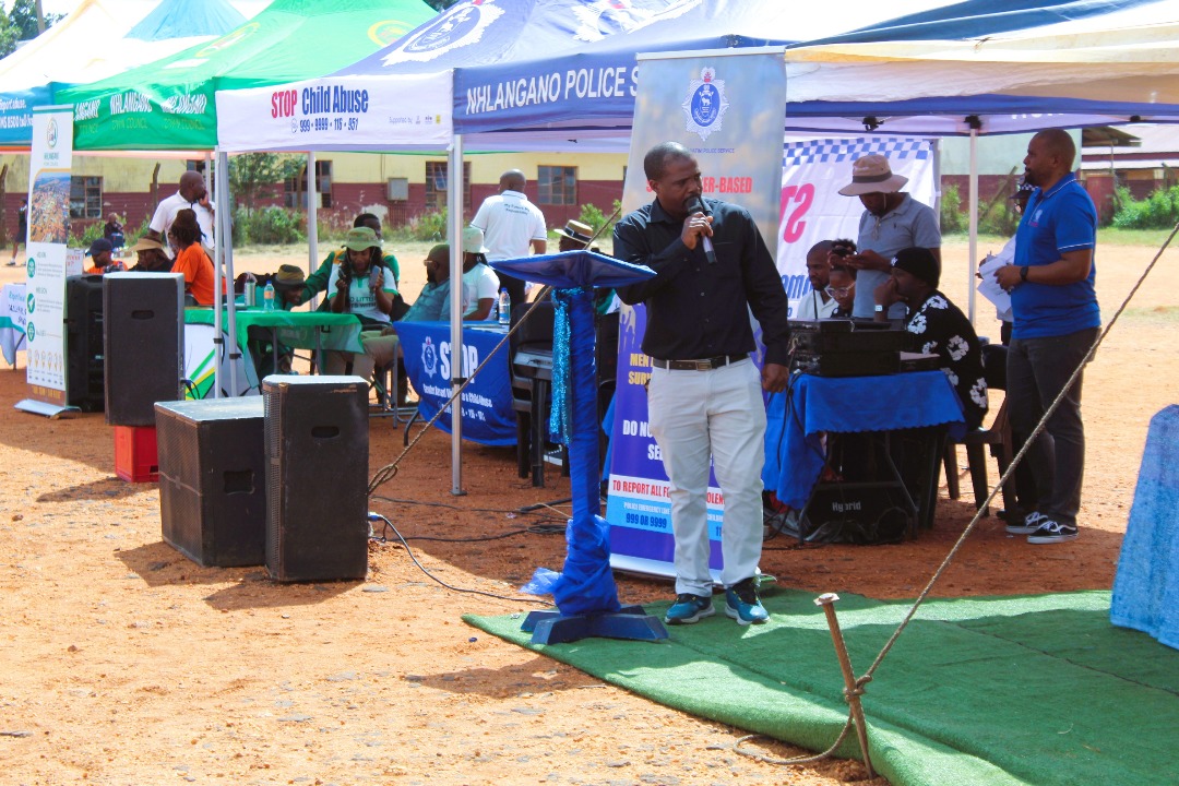 Community members and partners march through Nhlangano to demand justice and protection for children and vulnerable groups.