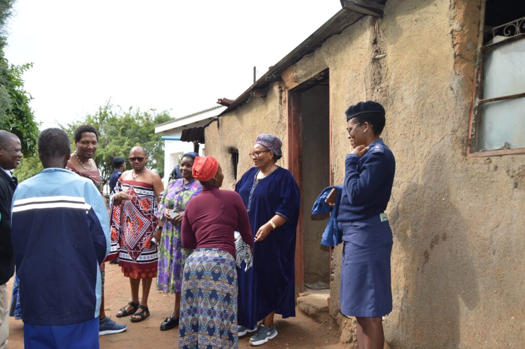 Deputy Prime Minister Thulisile Dladla hands over the new house to Mkhulu Albert Magongo in Macetjeni.
