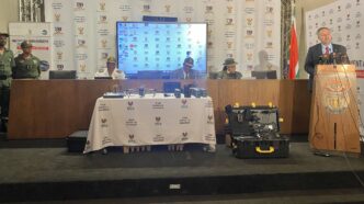 Home Affairs Minister Dr Leon Schreiber inspects a drone ahead of its deployment to strengthen border control over the Easter weekend.