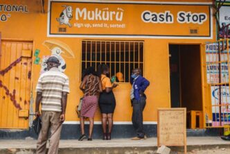 Customers queue at a Mukuru cash collection point