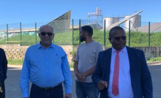 Eswatini Oil Mill Managing Director Mohamed Daud (right) discusses operations with Minister of Commerce, Industry and Trade Manqoba Khumalo during a site tour at the Matsapha facility.