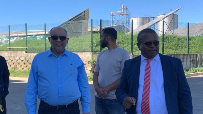 Eswatini Oil Mill Managing Director Mohamed Daud (right) discusses operations with Minister of Commerce, Industry and Trade Manqoba Khumalo during a site tour at the Matsapha facility.