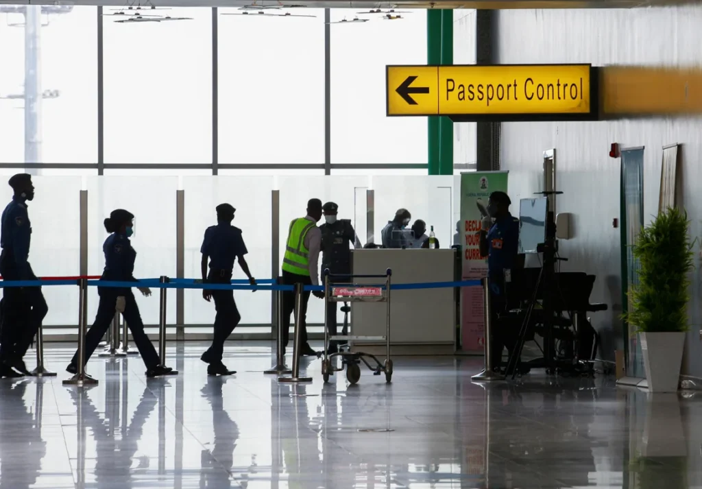 Security officers are seen at the passport control point at the Nnamdi Azikiwe international airport in Abuja, Nigeria September 7, 2020. REUTERS/Afolabi Sotunde Afolabi Sotunde/Reuters