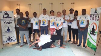 The High Commissioner of India to Eswatini joins participants in a group photo ahead of the public yoga session.Photo © High Commission of India – Mbabane