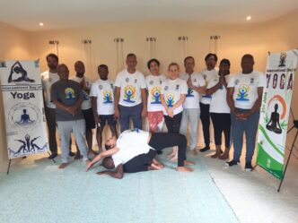 The High Commissioner of India to Eswatini joins participants in a group photo ahead of the public yoga session.Photo © High Commission of India – Mbabane