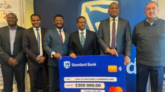 Standard Bank Eswatini Chief Executive Mvuselelo Fakudze (right) hands over a E300,000 sponsorship cheque to EIPA CEO Sibani Mngomezulu (left) during a ceremony marking the bank’s support for the upcoming Eswatini Investment Conference.