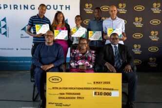 Graduates of the MTN-JA Entrepreneurship Programme pose for a group photo after receiving their certificates at Mpaka Vocational Training Centre.