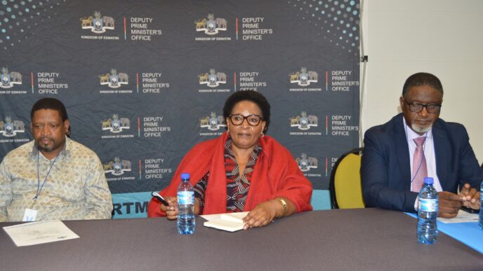 Deputy Prime Minister Thulisile Dladla shares a moment with Members of Parliament during the preview screening of the new family-reunion reality show, Asibambaneni Sibengumndeni, held at her office in Mbabane.