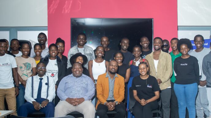 Participants and speakers, including SEDCO’s Bhekani Dlamini, pose for a group photo after the Startup Grind Manzini panel discussion at the American Corner, Manzini Library.