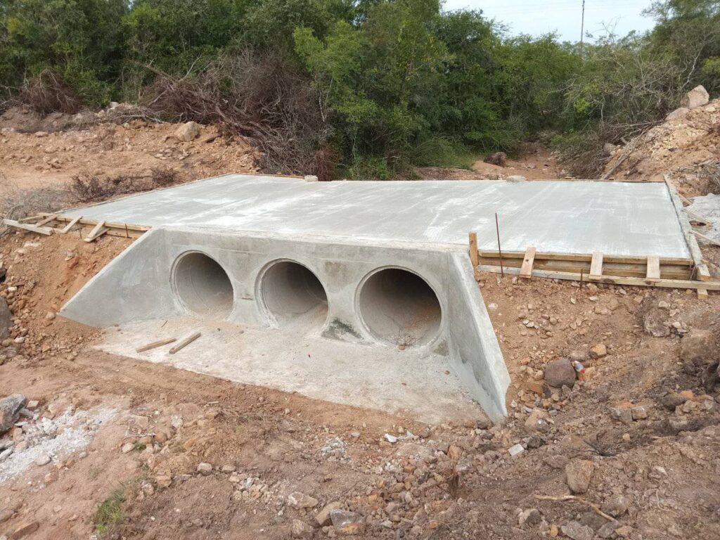 Construction workers at the KaNgaju low-level crossing site as the project reaches 75% completion, set to improve access for communities in Lubombo.