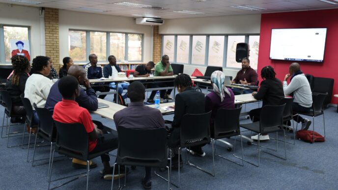Participants engage in a hands-on AI training session during the Action Junction workshop at American Corners in Mbabane. Photo by U.S. Embassy Eswatini
