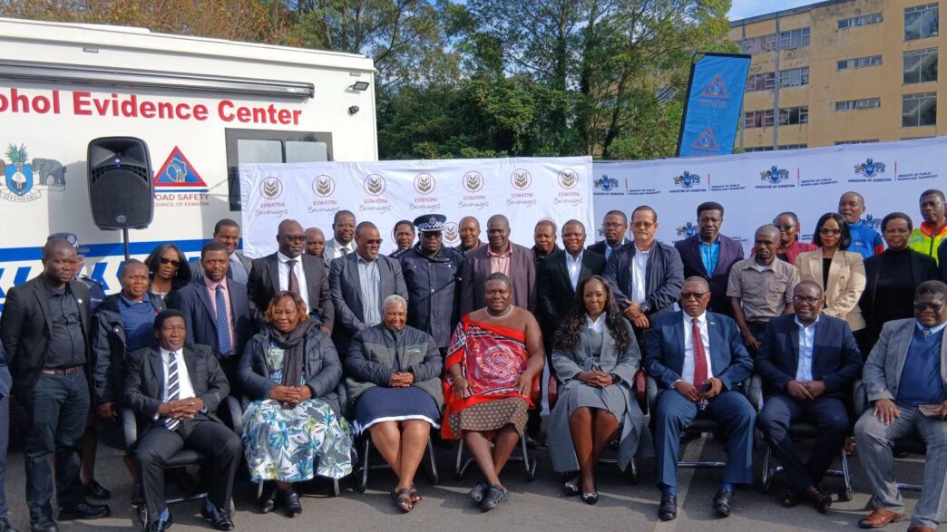Minister Chief Ndlaluhlaza Ndwandwe receives the new Alcohol Evidence Truck from Eswatini Beverages Country Director, Ms. Doreen Tumureebire, at the Ministry of Public Works and Transport in Mbabane. Photo: Ministry of Public Works and Transport building with the Alcohol Evidence Truck parked outside.
