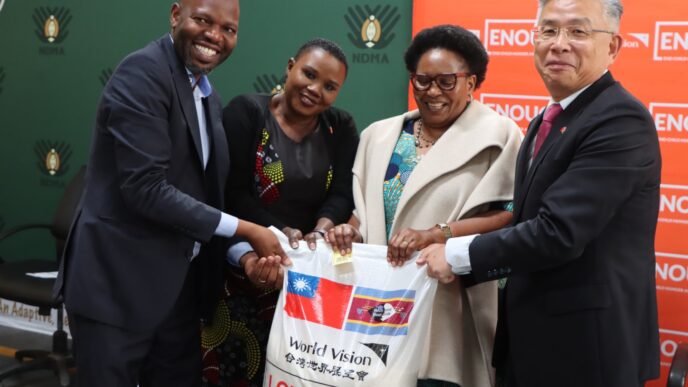 Deputy Prime Minister Thulisile Dladla receives a symbolic bag of rice during the launch of the national food assistance programme at the NDMA Warehouse in Matsapha, following a 2,000-ton donation from the Republic of China (Taiwan). Photo: NDMA