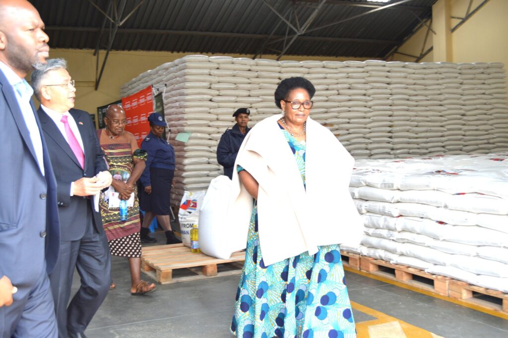 Deputy Prime Minister Thulisile Dladla receives a rice donation from Taiwan’s Ambassador Jeremy Liang during a handover ceremony at the NDMA Warehouse in Matsapha. Photo by DPM Office