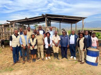 Officials from the Ministry of Agriculture pose with EADF-supported farmers during a monitoring visit to various agribusiness sites across Eswatini.
