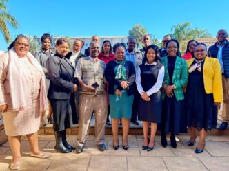 Members of the Financial Inclusion Technical Committee pose for a group photo after the strategy planning session in Mbabane.