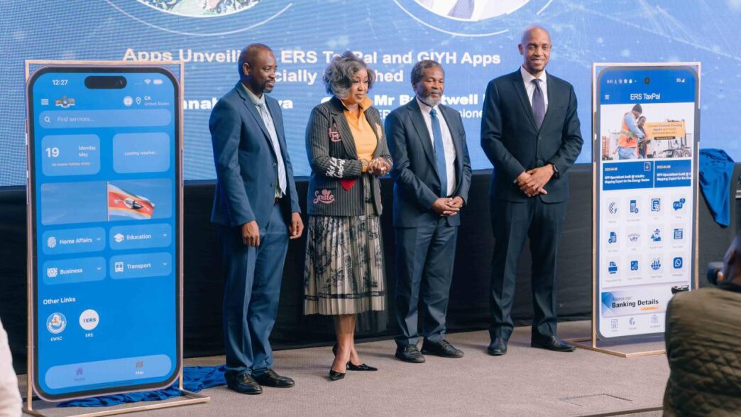 Minister of ICT Savannah Maziya (center) and ERS Commissioner General Brightwell Nkambule (right) unveil the Government In Your Hand and ERS TaxPal mobile applications during the launch event in Ezulwini.