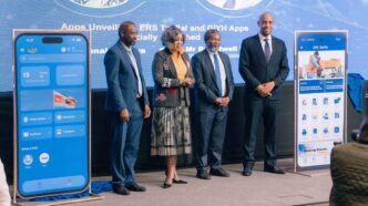 Minister of ICT Savannah Maziya (center) and ERS Commissioner General Brightwell Nkambule (right) unveil the Government In Your Hand and ERS TaxPal mobile applications during the launch event in Ezulwini.