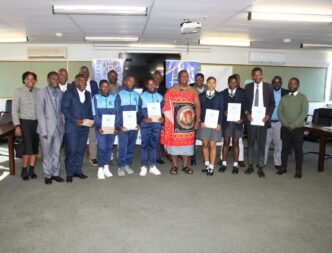 Minister of Labour and Social Security Phila Buthelezi joins students and teachers from Lamawandla and Mkhuzweni High Schools for a group photo after celebrating their top placements at the 2024 Aqualibrium Water Competition in South Africa.