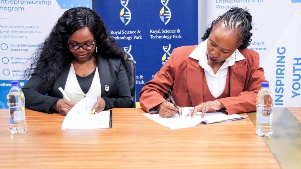 JA Eswatini Executive Director Phetsile Masilela signs the MoU with RSTP Acting CEO Nomvuyo Gulwako during a brief ceremony at the Royal Science and Technology Park. Photo: JA Eswatini