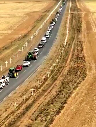 White crosses lining a road in Normandien in 2020. Picture: X/@ConCaracal