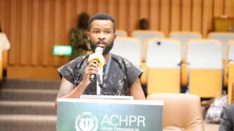 Melusi Simelane representing SALC delivers an address at the 83rd African Commission session in Banjul