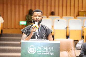 Melusi Simelane representing SALC delivers an address at the 83rd African Commission session in Banjul