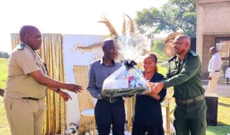 Retiring officers honored: Big Bend Correctional staff present gifts to Assistant Chief Officer Ernest Dlamini and Sergeants Jeremiah Maziya and Mbuyazwe Gina during a farewell event held at the facility.