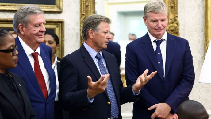 Retief Goosen, center, speaks during a meeting between President Donald Trump and Cyril Ramaphosa, South Africa's president in the Oval Office of the White House in Washington, DC, on Wednesday, May 21. Jim Lo Scalzo/EPA/Bloomberg/Getty Images