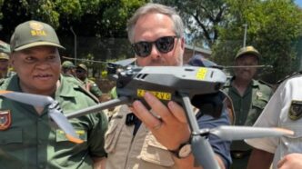 Leon Schreiber, South Africa’s Minister of Home Affairs, displays a drone used in border surveillance operations.