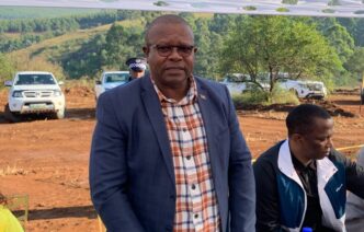 Minister of Commerce, Industry and Trade Manqoba Khumalo breaks ground at the Piggs Peak factory site, marking the start of a E135 million textile project expected to create over 1,000 jobs.