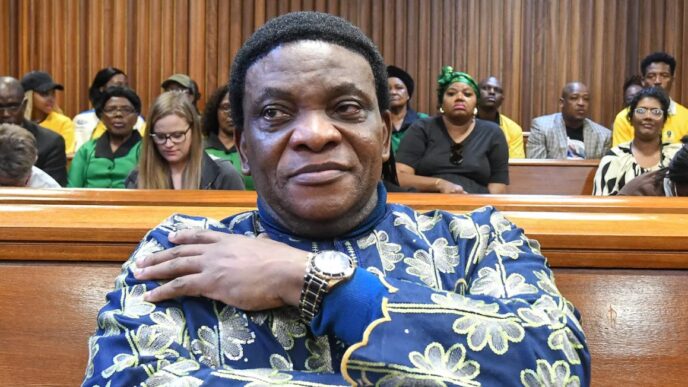 Nigerian Pastor Timothy Omotoso smiles after the verdict was passed at the Gqeberha High Court on April 02, 2025 in Gqeberha, South Africa. It is reported that the Nigerian televangelist and two co accused were acquitted of over 30 charges, including rape, human trafficking and racketeering. (Photo: Gallo Images / Die Burger / Lulama Zenzile)