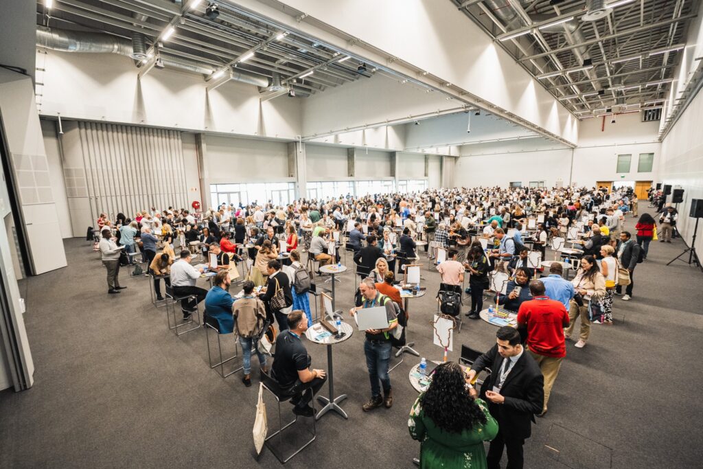 Delegates engage exhibitors from various travel agencies on the exhibition floor at WTM Africa 2025. Photo by WTM Africa.