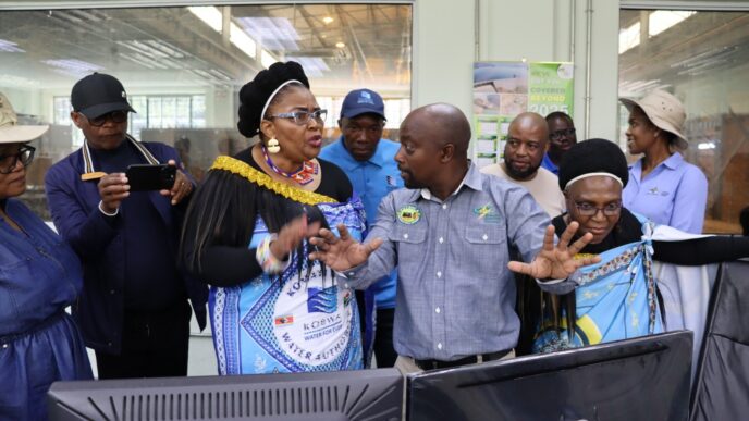 South Africa’s Minister of Water and Sanitation, Pemmy Majodina, engaging with officials during her tour of the Maguga Hydro Power Station.