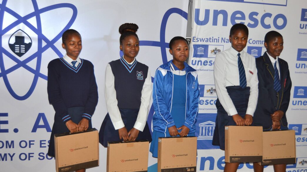 Learners from the Shiselweni Region hold laptops during a STEM activation programme supported by UNESCO and the Kingdom of Eswatini Academy of Sciences. Photo by UNESCO Eswatini.
