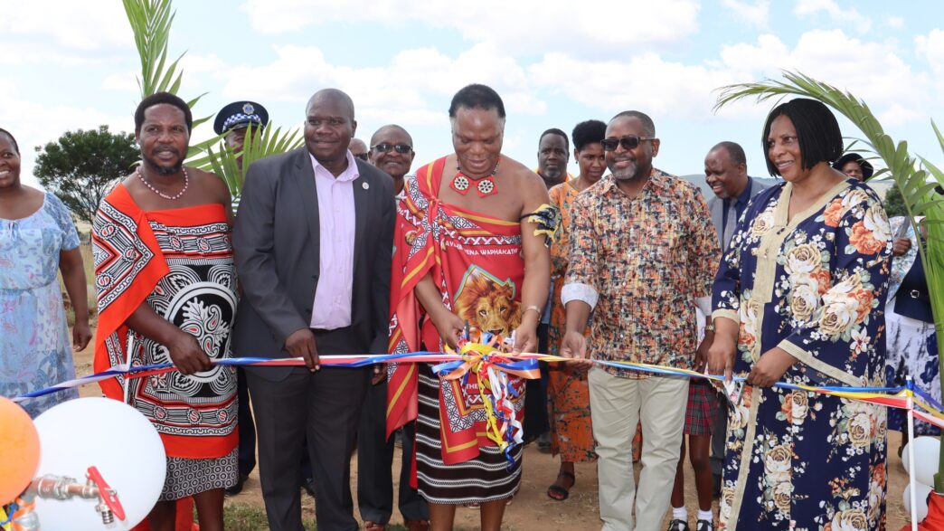 Minister HRH Prince Lonkhokhela and Amos Zaindi, National Director of World Vision Eswatini, cut the ribbon to officially launch the Mlindazwe-Tsambekwayo Water Supply and Sanitation Project in Gege.