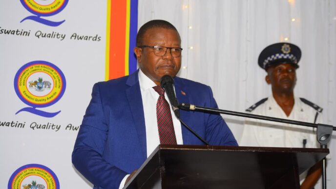 Honourable Manqoba B. Khumalo, Minister of Commerce, Industry and Trade, addresses stakeholders during the industry awards ceremony at The George Hotel in Manzini.