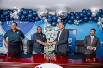 SNAT Savings and Credit Cooperative Society and Standard Bank Eswatini officials pose after signing the UNAYO partnership. Photo: SNAT Savings and Credit Cooperative Society