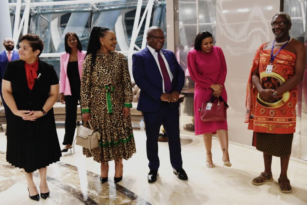 Minister of Foreign Affairs Pholile Shakantu and Minister of Commerce and Trade Manqoba Khumalo meet with fellow delegates during the OACPS Summit in Malabo.